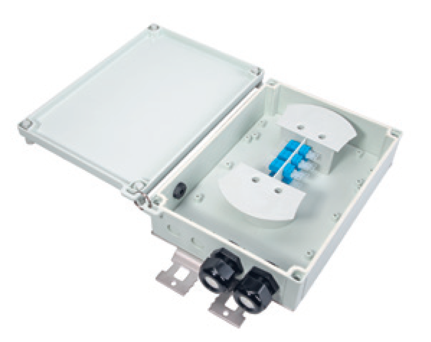 Open junction box with terminal blocks inside.